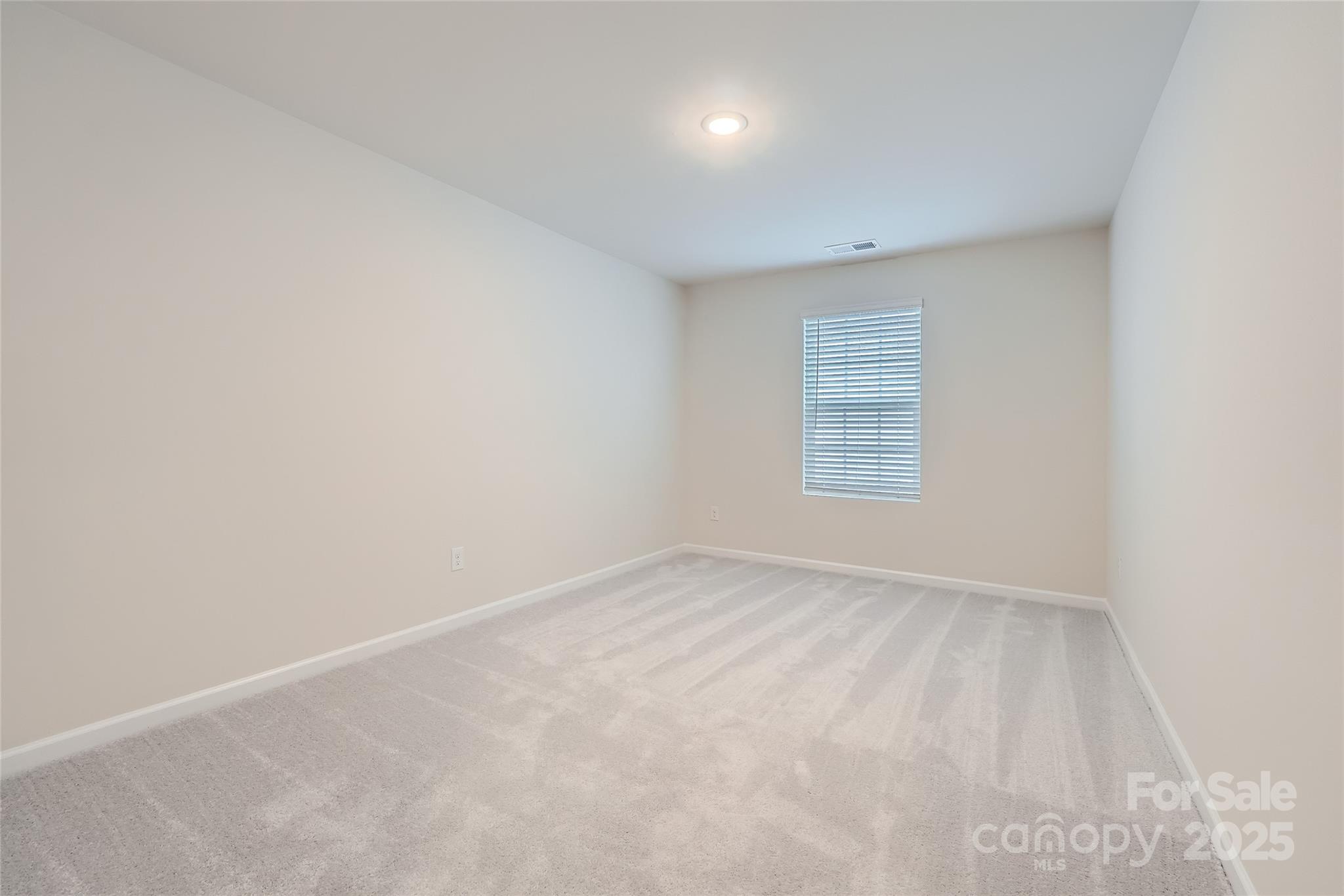 1608 Cannonball Lane Bessemer City, NC 28016 - Photo 12 of 13 an empty room with windows