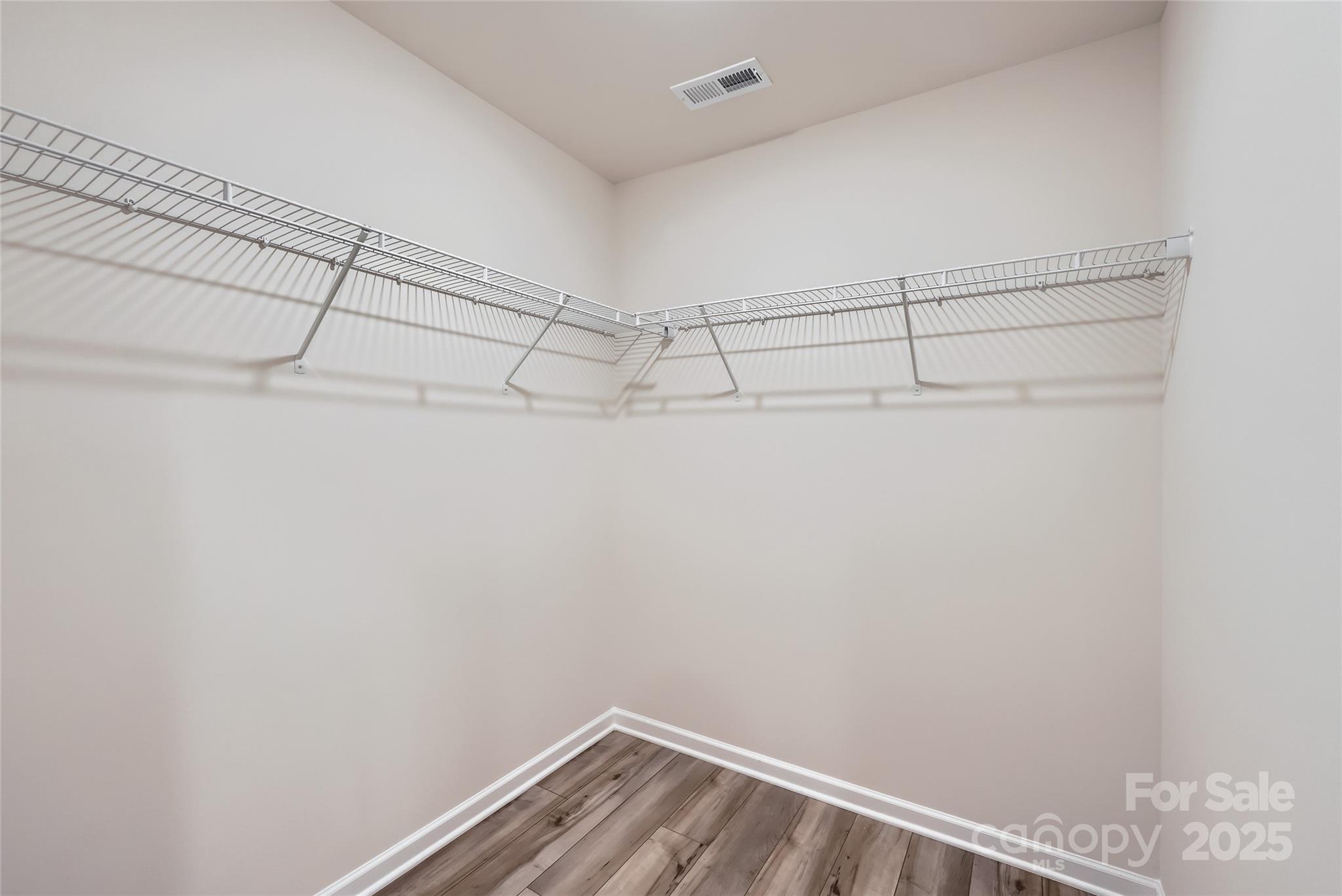 1608 Cannonball Lane Bessemer City, NC 28016 - Photo 9 of 13 a view of a room with racks on the wall