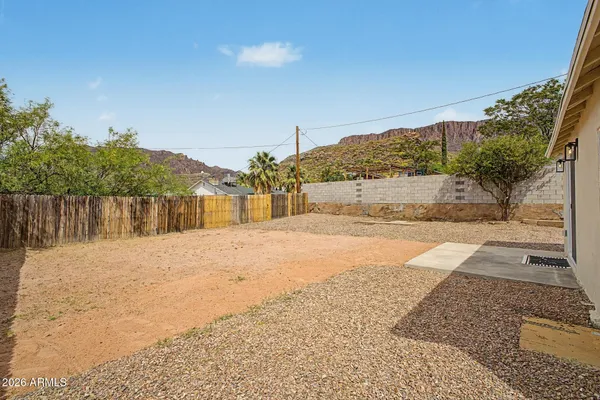 a view of a backyard of a house