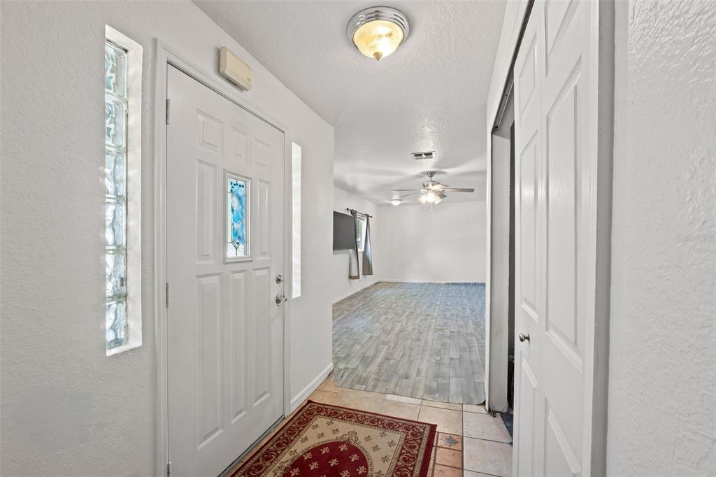 304 Shepard Avenue Dundee, FL 33838 - Photo 18 of 62 a bathroom with a sink and mirror