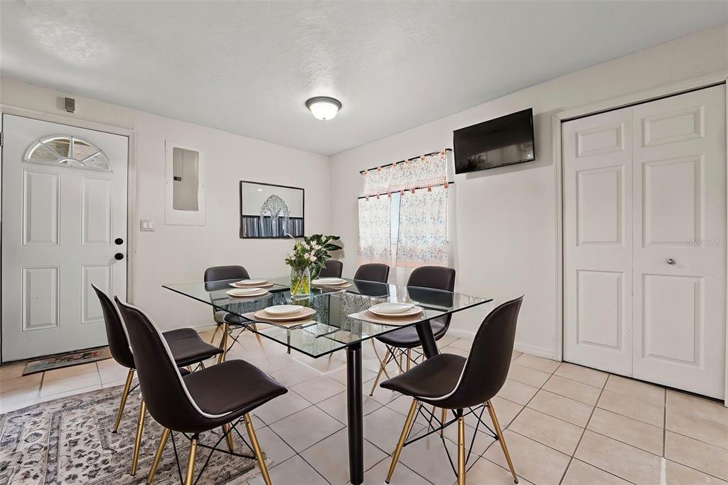 304 Shepard Avenue Dundee, FL 33838 - Photo 30 of 62 a view of a dining room with furniture and a window