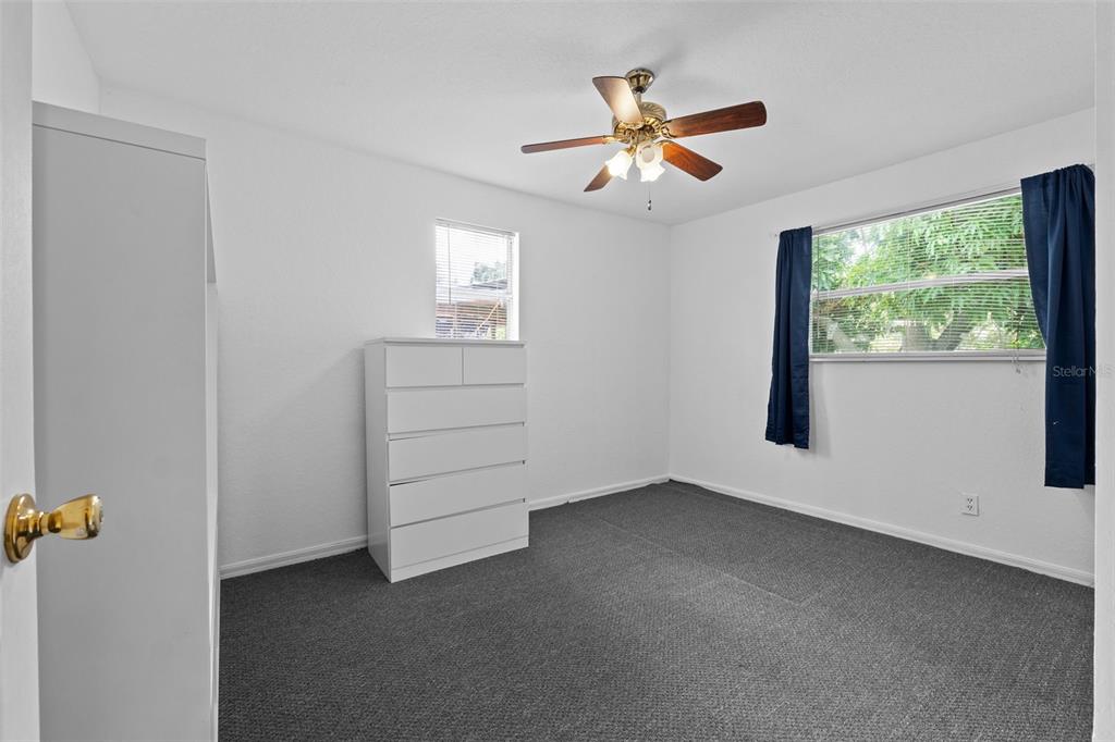304 Shepard Avenue Dundee, FL 33838 - Photo 37 of 62 a view of room with window and ceiling fan