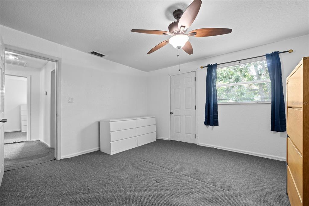 304 Shepard Avenue Dundee, FL 33838 - Photo 44 of 62 a view of an empty room with a window