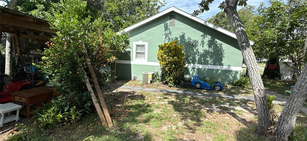 304 Shepard Avenue Dundee, FL 33838 - Photo 5 of 62 a view of house with tree in front of it