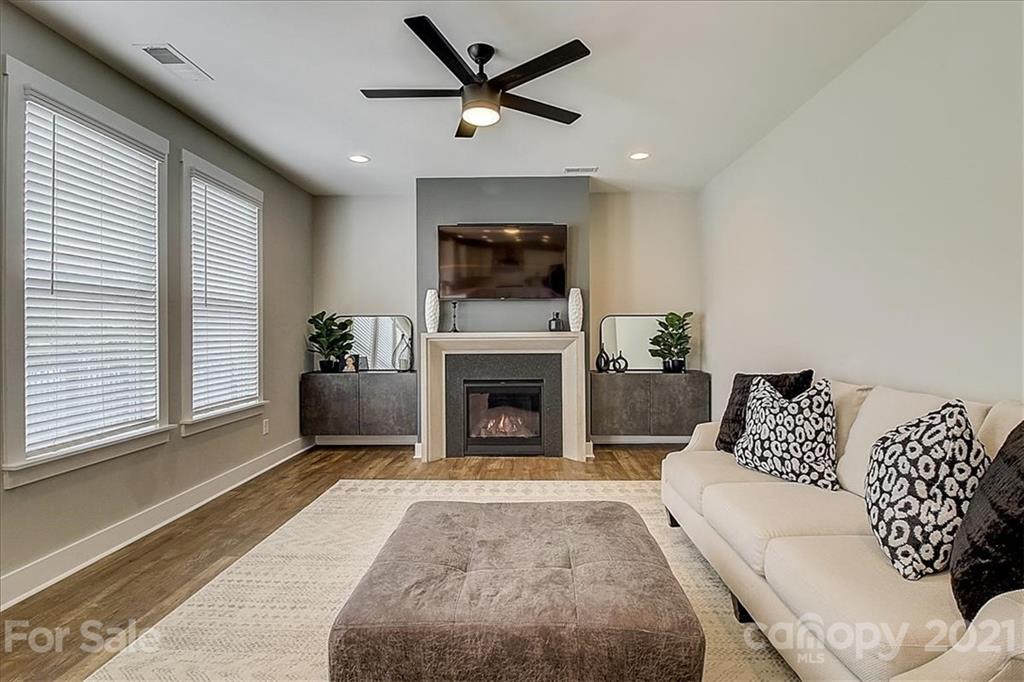 1217 Therns Ferry Drive Fort Mill, SC 29708 - Photo 11 of 47 a living room with furniture and a fireplace
