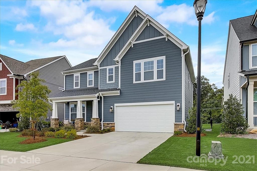1217 Therns Ferry Drive Fort Mill, SC 29708 - Photo 3 of 47 a front view of a house with garden