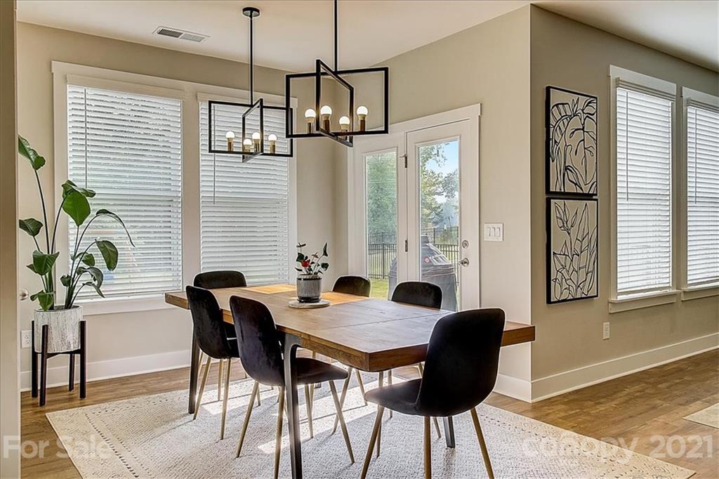 1217 Therns Ferry Drive Fort Mill, SC 29708 - Photo 21 of 47 a view of a dining room with furniture window and outside view