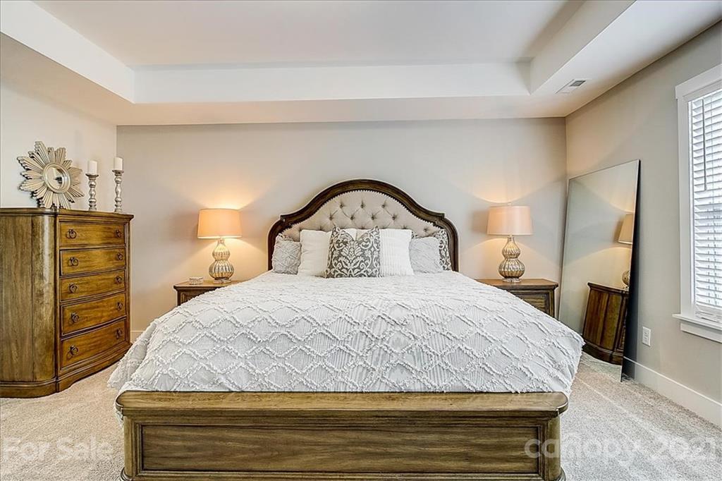1217 Therns Ferry Drive Fort Mill, SC 29708 - Photo 27 of 47 a bedroom with a bed and a dresser