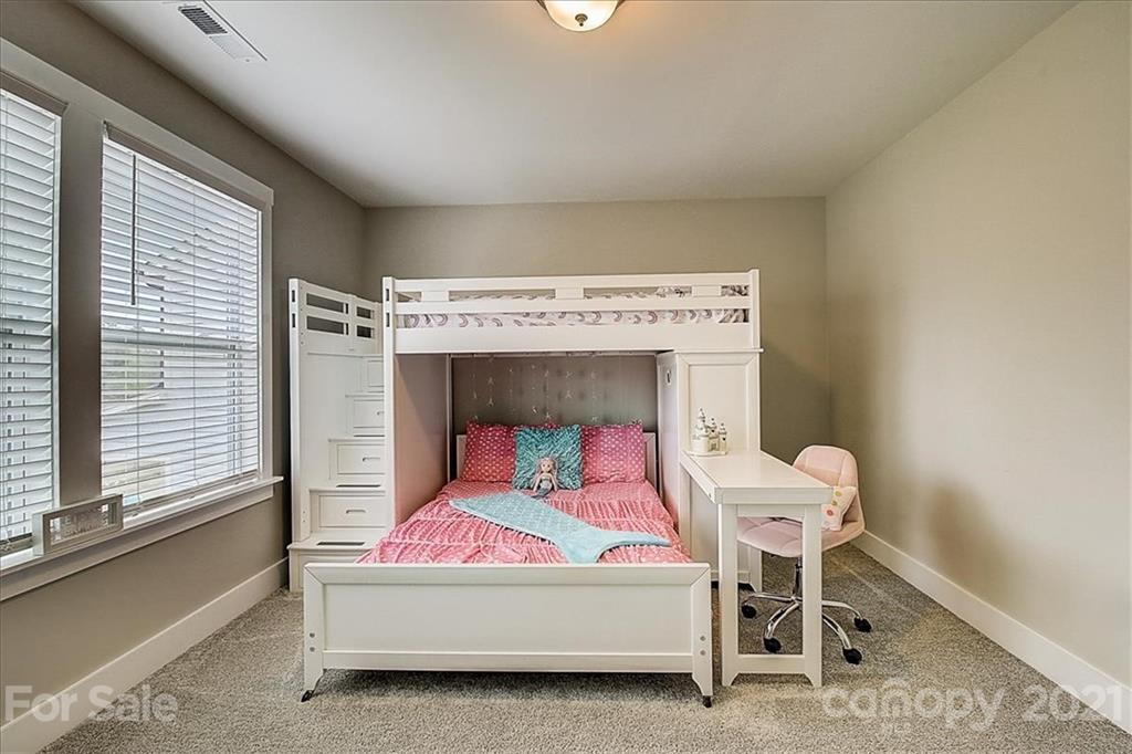 1217 Therns Ferry Drive Fort Mill, SC 29708 - Photo 37 of 47 a bedroom with a bed chair and a window