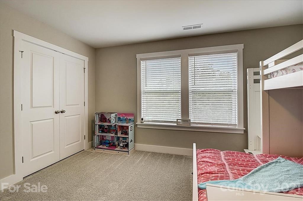 1217 Therns Ferry Drive Fort Mill, SC 29708 - Photo 38 of 47 a view of a bedroom with a bed and a window