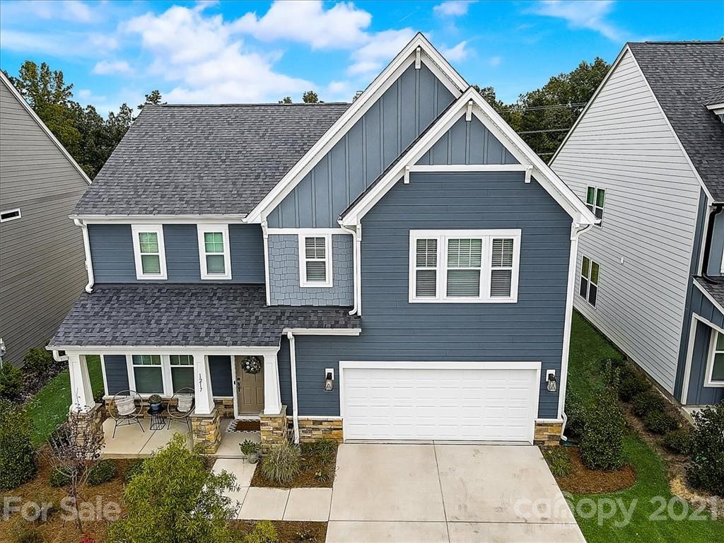 1217 Therns Ferry Drive Fort Mill, SC 29708 - Photo 42 of 47 a front view of a house with a yard