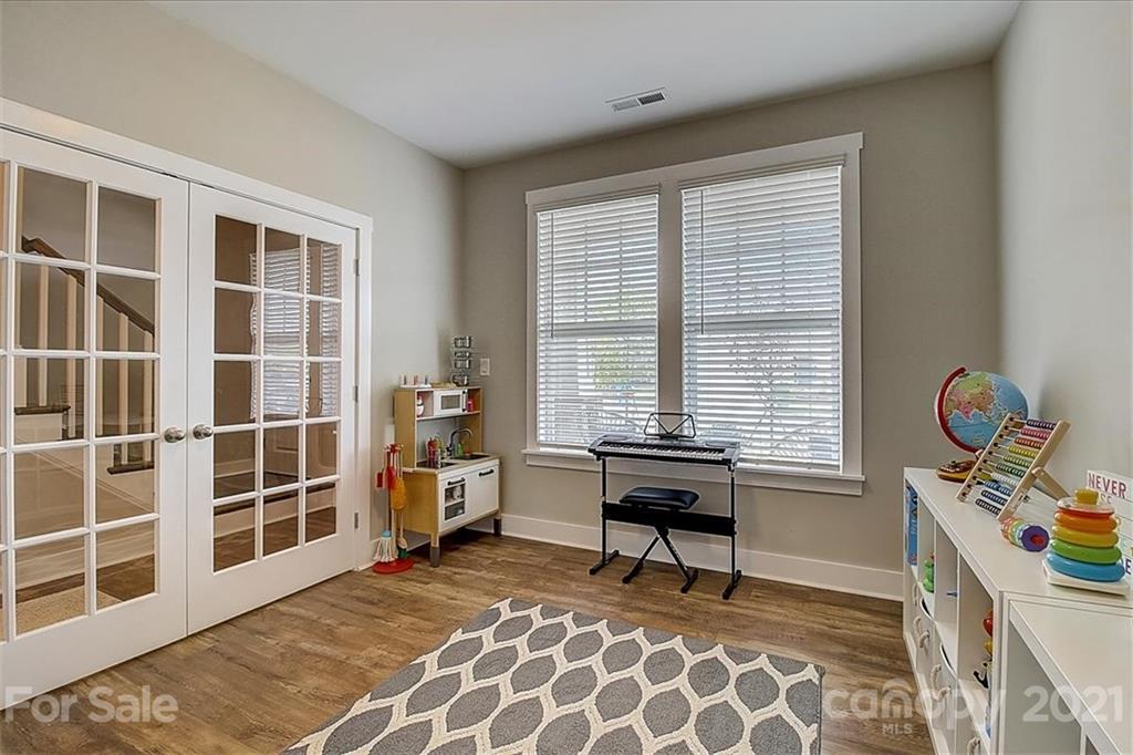 1217 Therns Ferry Drive Fort Mill, SC 29708 - Photo 7 of 47 a bedroom with furniture and a window