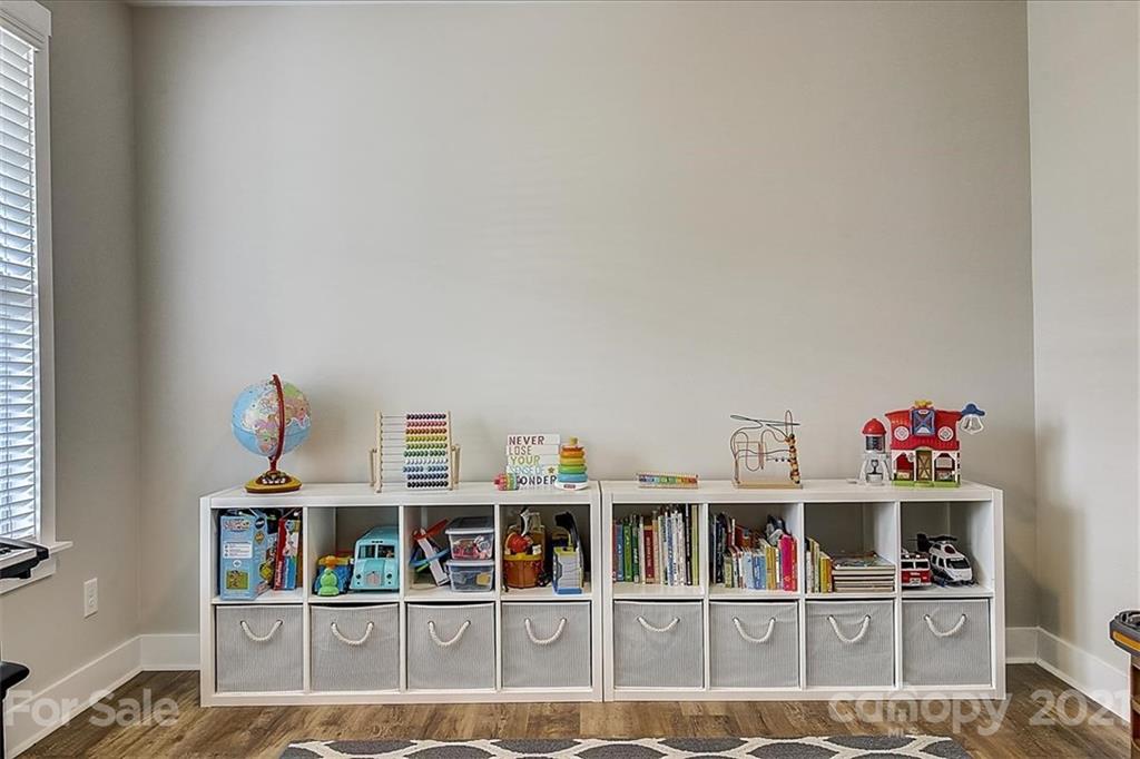1217 Therns Ferry Drive Fort Mill, SC 29708 - Photo 8 of 47 a bed room with a book shelf