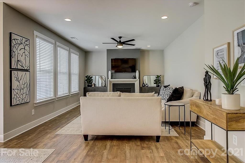1217 Therns Ferry Drive Fort Mill, SC 29708 - Photo 9 of 47 a living room with furniture and a fireplace