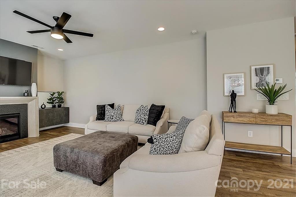 1217 Therns Ferry Drive Fort Mill, SC 29708 - Photo 10 of 47 a living room with furniture and a fireplace