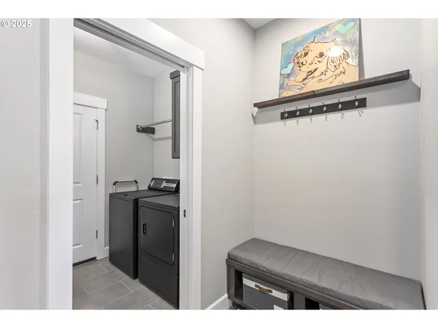 a kitchen with a refrigerator and a stove