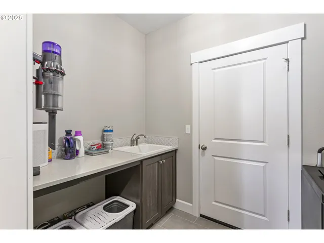 a bathroom with a sink vanity and a mirror