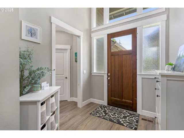 a view of wooden floor and a bathroom sink