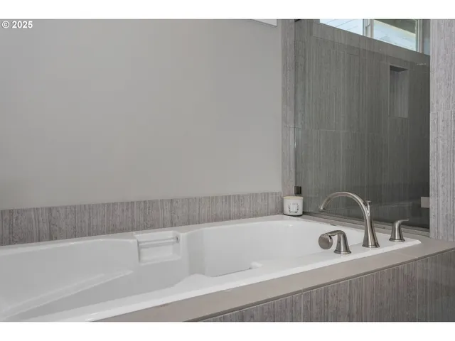 a bathroom with a sink and a bathtub