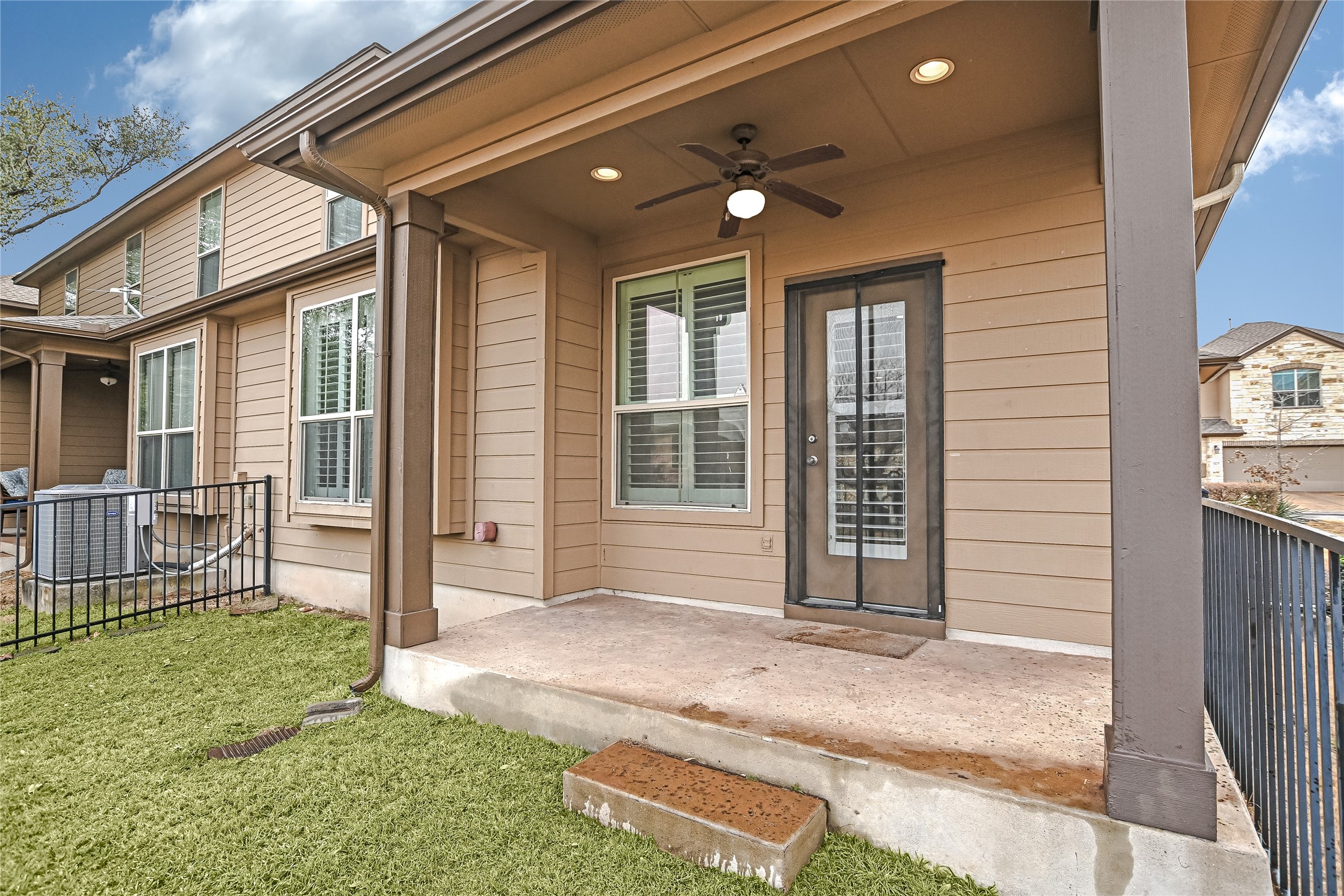 14001 Avery Ranch Boulevard, Unit 1601 Austin, TX 78717 - Photo 15 of 25 View of exterior entry featuring ceiling fan