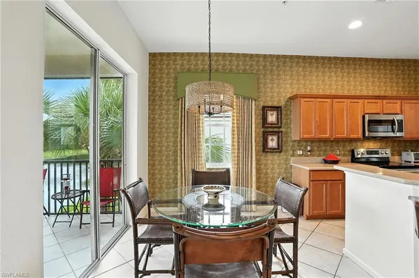 a bathroom with a sink vanity tub and a mirror