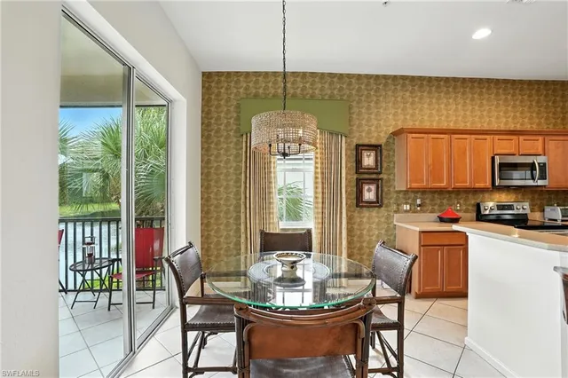 a bathroom with a sink vanity tub and a mirror