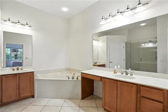 a view of a livingroom with workspace and a couch