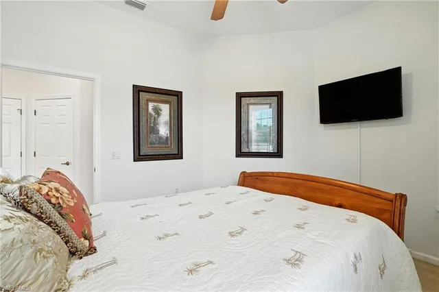 a front view of a house with a yard table and chairs