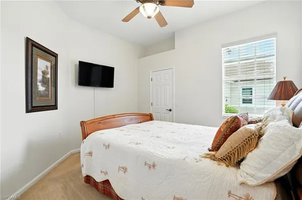 an aerial view of a city with lots of residential buildings lake and ocean view