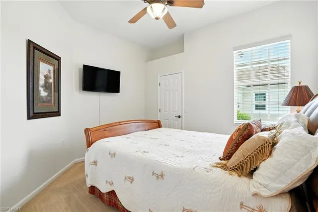 an aerial view of a city with lots of residential buildings lake and ocean view