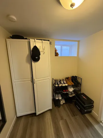 a bedroom with a bed and dresser