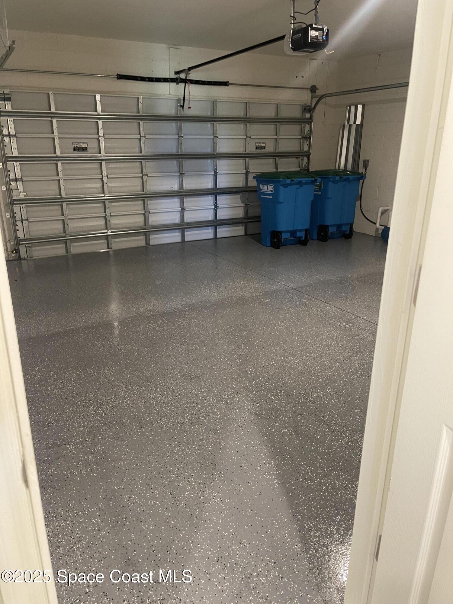 7055 Topaz Drive Grant-Valkaria, FL 32949 - Photo 19 of 24 a view of a room with racks on the wall