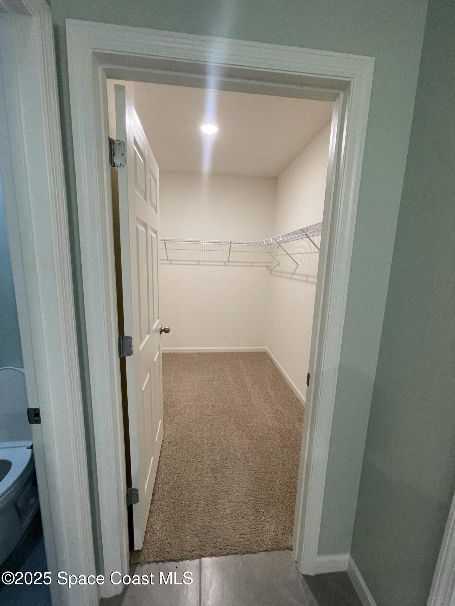 7055 Topaz Drive Grant-Valkaria, FL 32949 - Photo 4 of 24 a view of front door