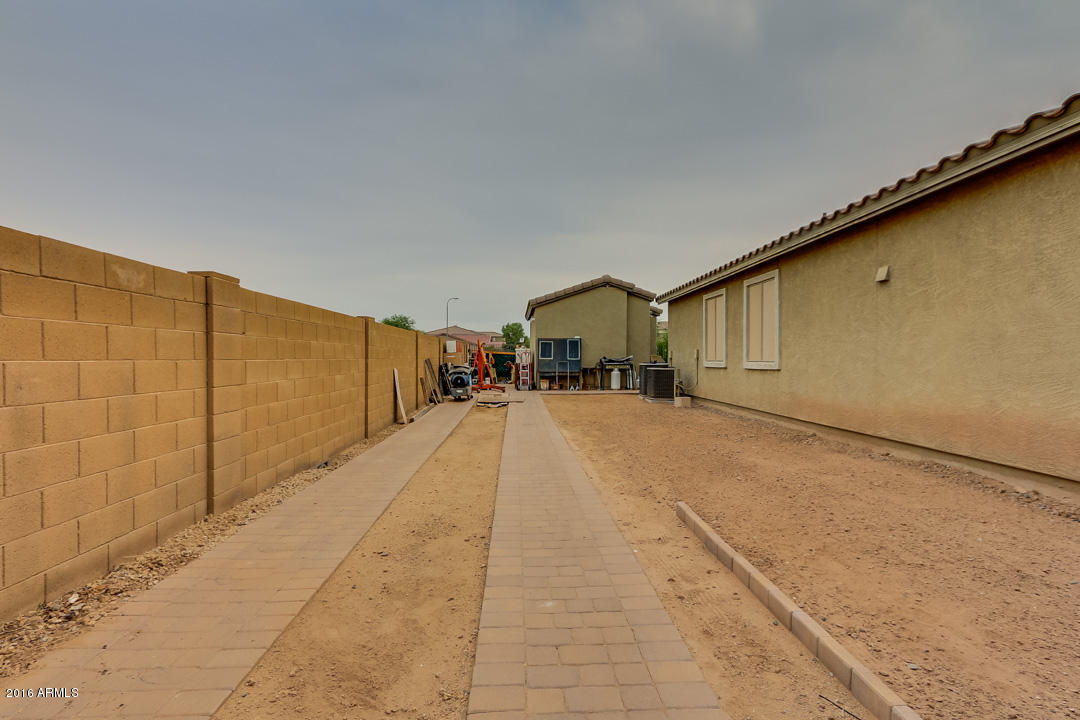 6801 West Maldonado Road Laveen, AZ 85339 - Photo 47 of 49 Side Yard w/ Pavers