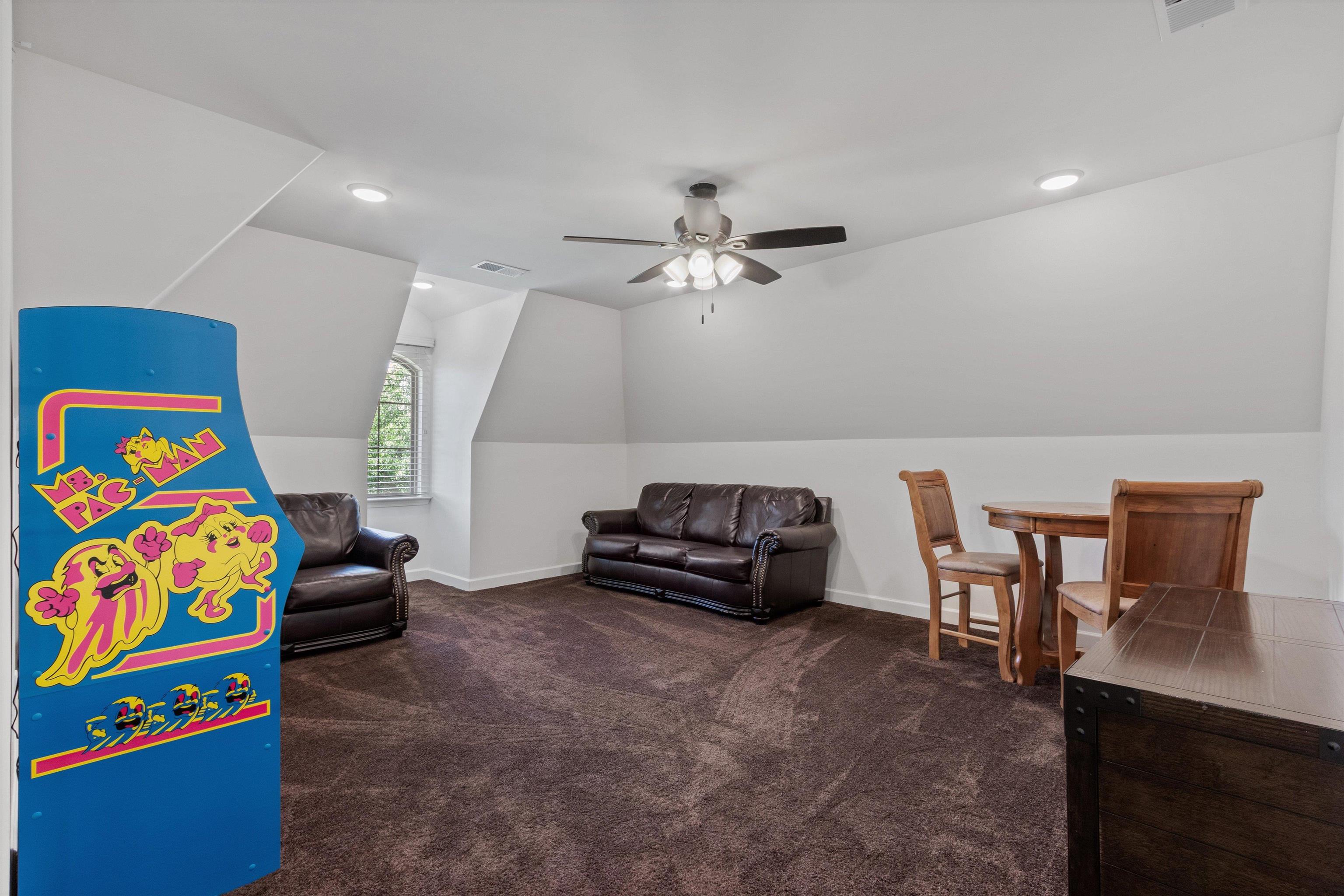 65 Watson Road Oakland, TN 38060 - Photo 28 of 40 a living room with furniture and a flat screen tv