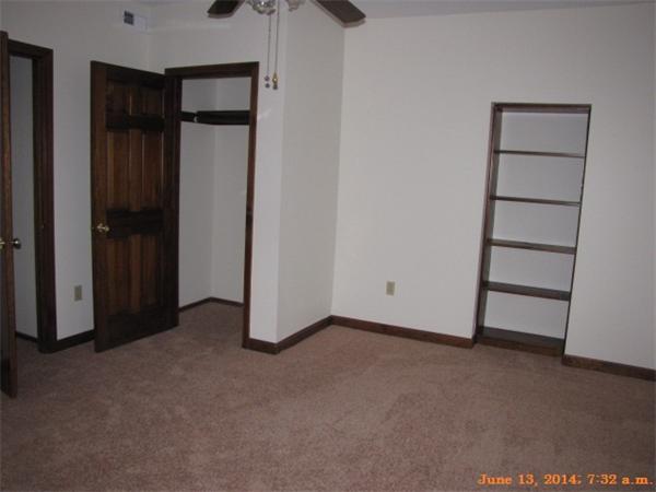 325 Mammoth Road, Unit 2 Lowell, MA 01854 - Photo 4 of 9 an empty room with closet