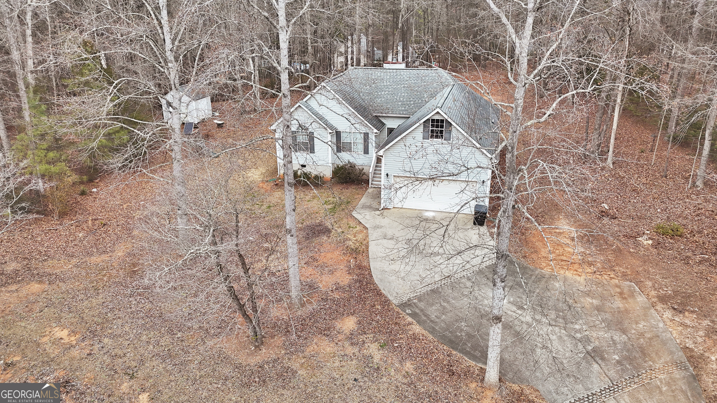 192 Duncans Mill Road Locust Grove, GA 30248 - Photo 15 of 17 a view of a terrace with a yard