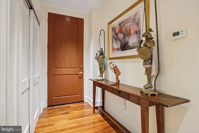 a view of a hallway with stairs