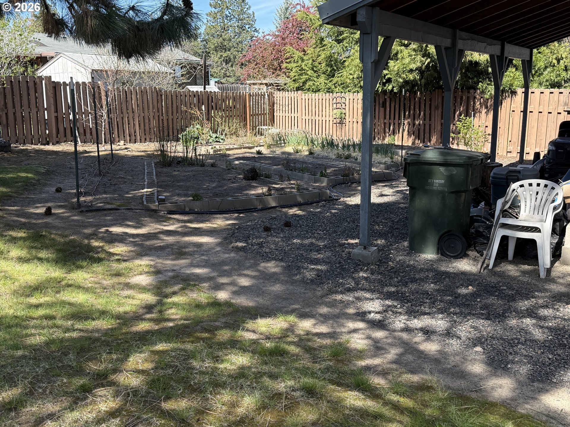110 South Mike Road Tygh Valley, OR 97063 - Photo 31 of 42 a backyard of a house with table and chairs