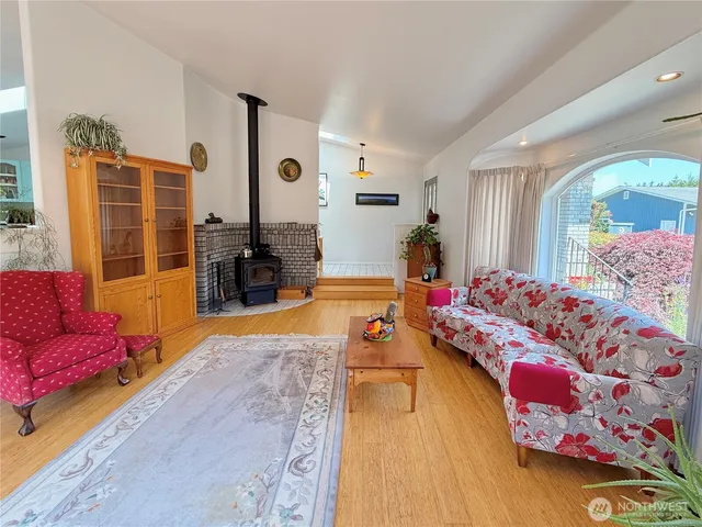 a living room with furniture and a table