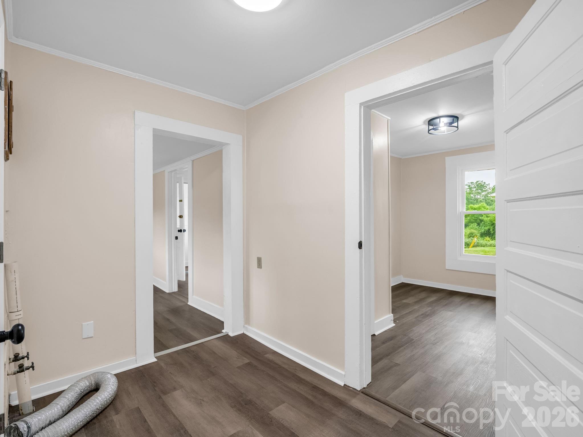 170 Dobbins Road Ellenboro, NC 28040 - Photo 20 of 32 a view of livingroom with hardwood floor and a hallway