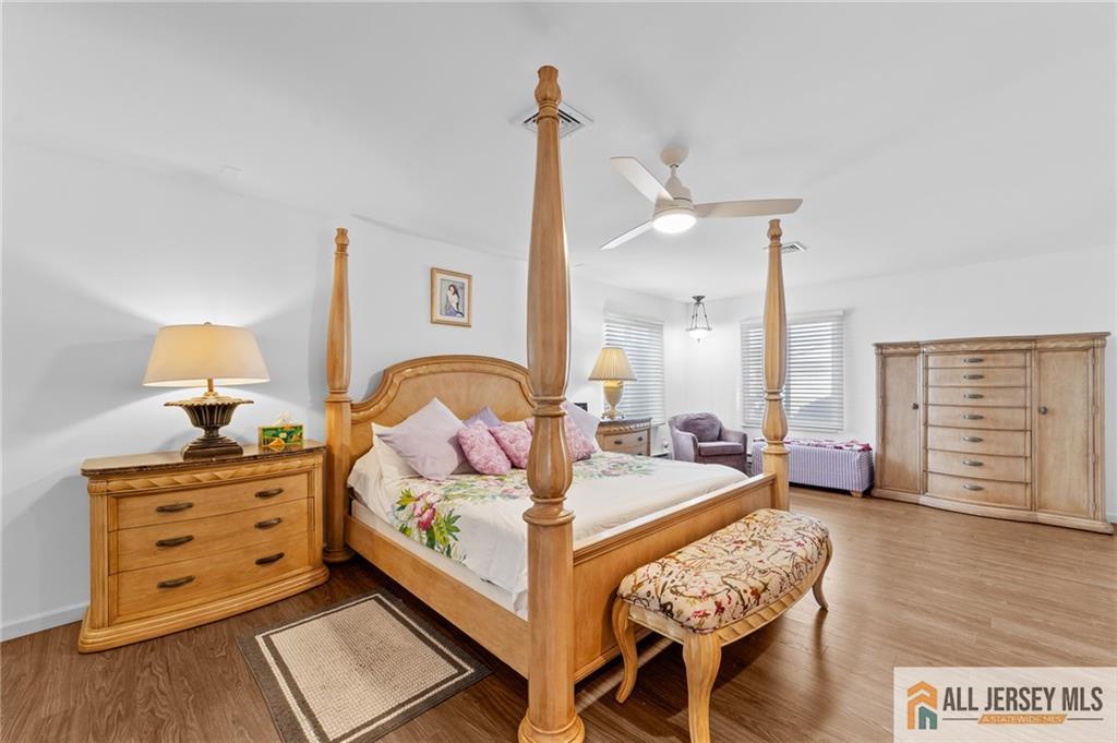 264A Glen Road, Unit 264A Monroe Township, NJ 08831 - Photo 16 of 31 a living room with furniture and wooden floor