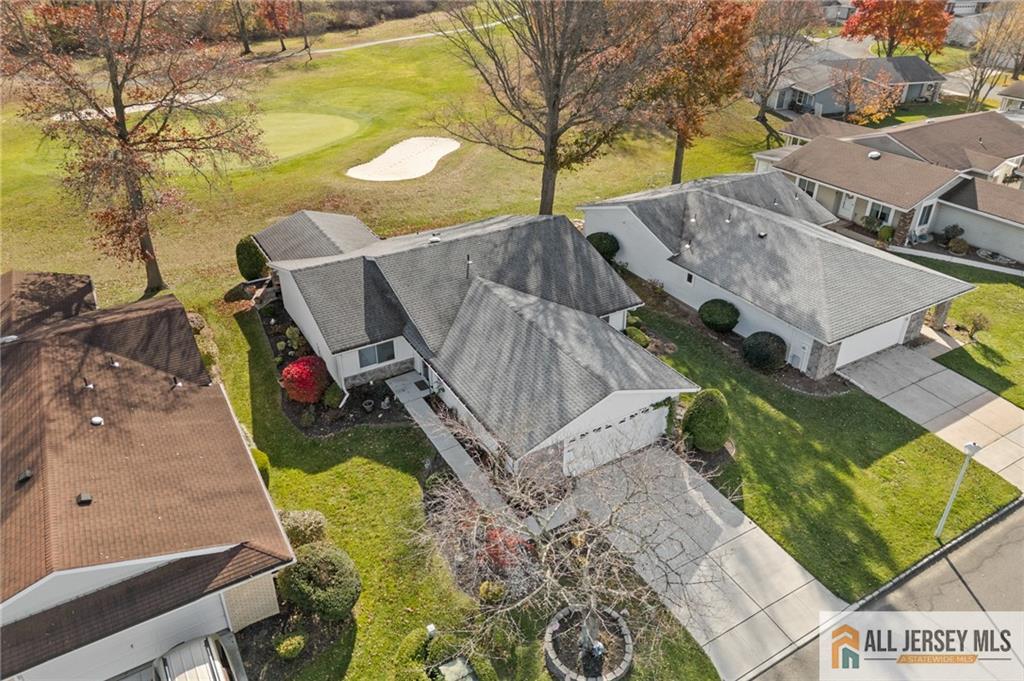 264A Glen Road, Unit 264A Monroe Township, NJ 08831 - Photo 9 of 31 an aerial view of residential houses with outdoor space