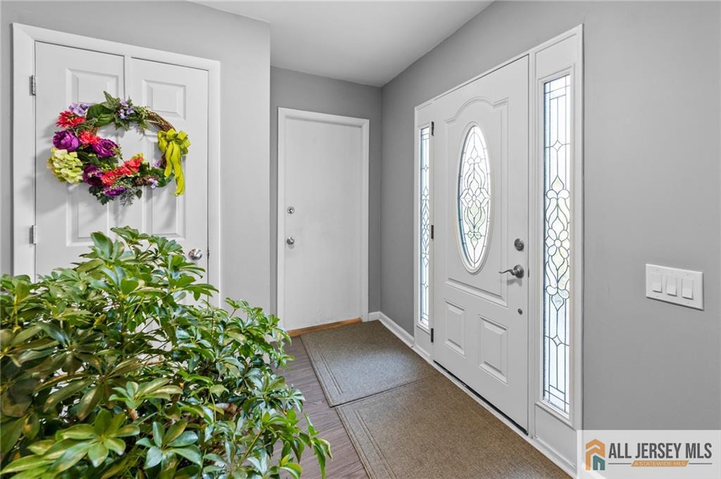 264A Glen Road, Unit 264A Monroe Township, NJ 08831 - Photo 10 of 31 view of entryway with flower pots