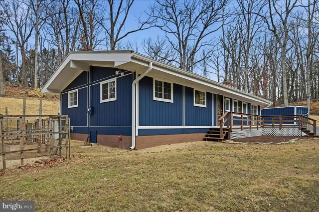 a view of a house with a large window