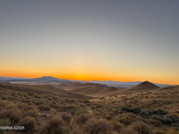 a view of a house with a mountain