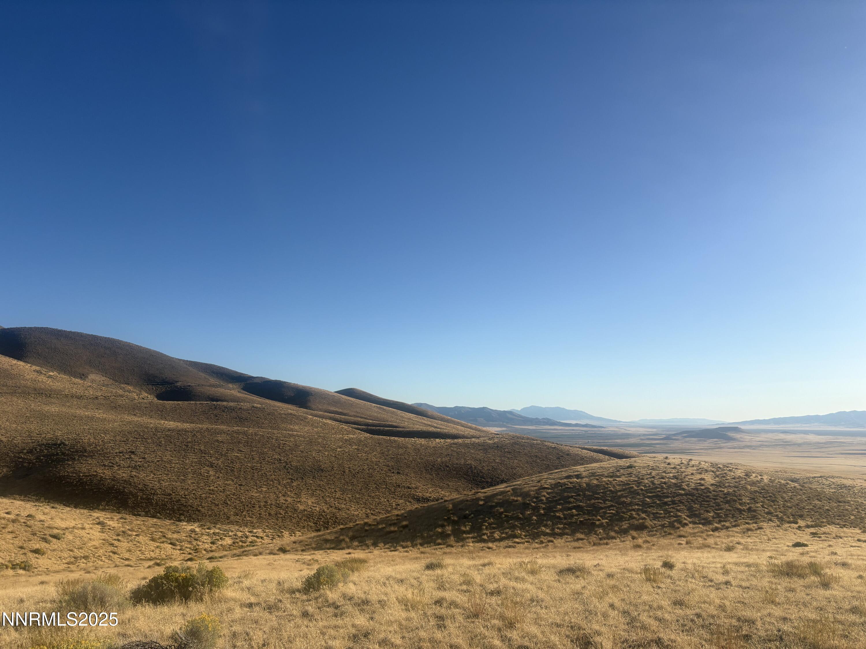 10001104 Wmca Mtn Road Winnemucca, NV 89445 - Photo 7 of 11 a view of ocean and with mountain