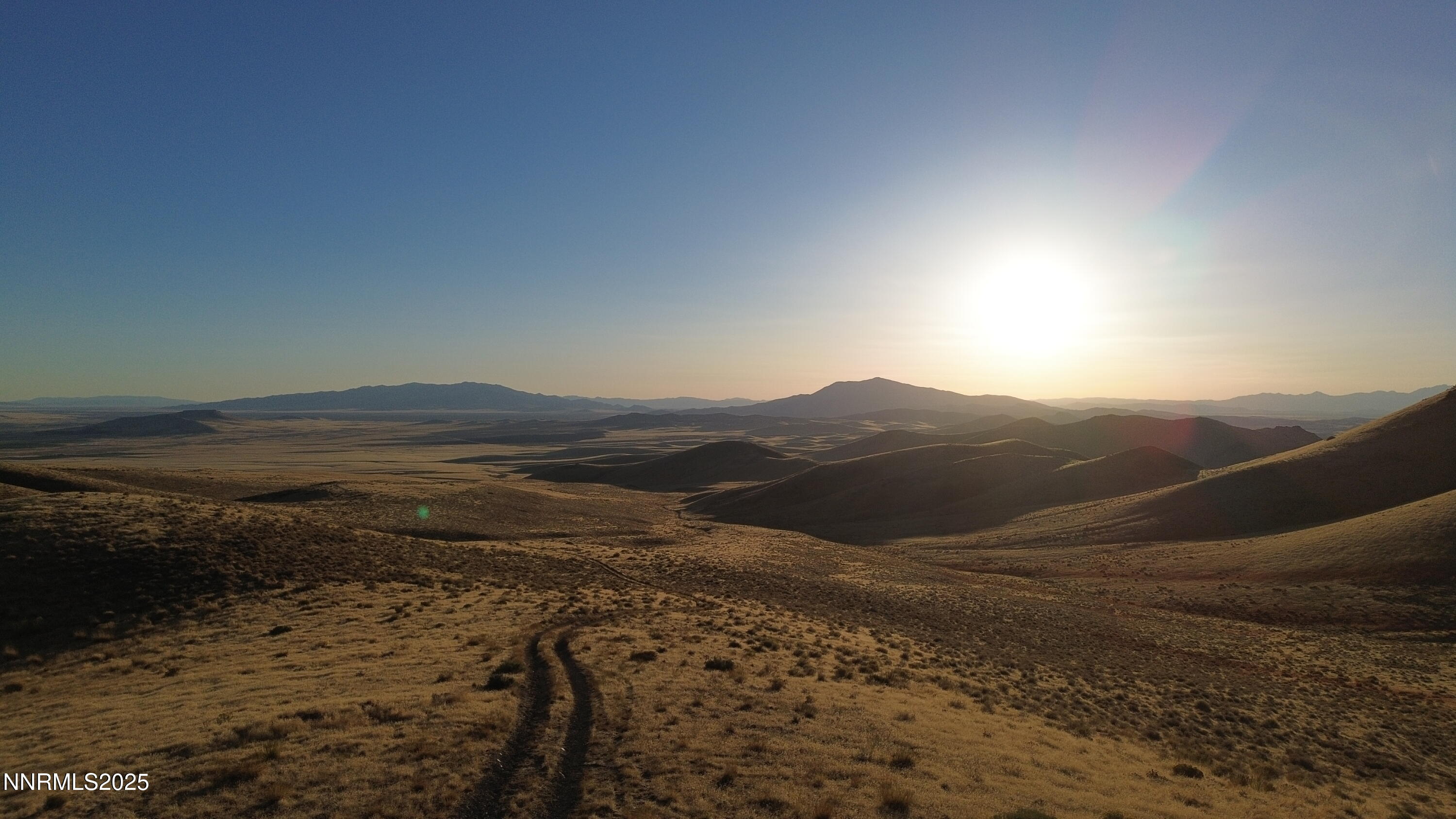 10001104 Wmca Mtn Road Winnemucca, NV 89445 - Photo 10 of 11 a view of an ocean beach and mountain