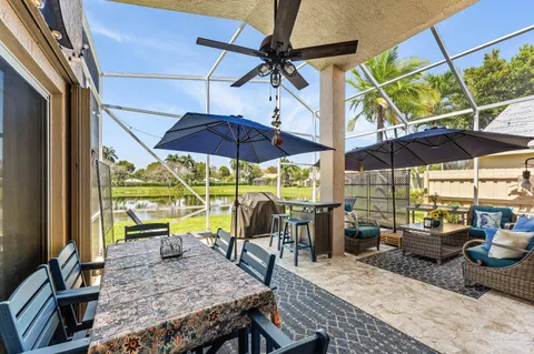 a view of an outdoor space with furniture