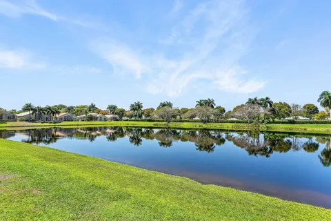 a view of a lake with houses with outdoor space